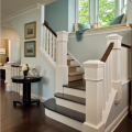 staircase-with-large-newel-posts-and-window-seat