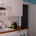 kitchen remodel on the cheap blue turquoise walls cute white cabinets remodelaholic.com feature pic (600x307)
