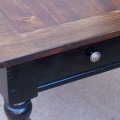 black-end-table-with-stained-wood-top