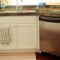 remodelaholic-remodeling-kitchen-white-cabinets-pink-postcard-blog (570x255)