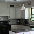 white-kitchen-cabinets-with-dark-countertops (1)