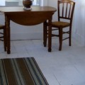 remodelaholic-remodeling-back-porch-white-washed-walls (570x238)