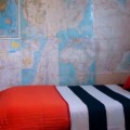 boys-bedroom-map-wall-striped-bedspread-remodelaholic-free-stylin (583x244)