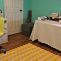 craft-room-chevron-yellow-rug-turquoise-walls-remodelaholic.com-featured image (584x260)