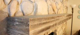 Installing a wood mantel on a stone wall