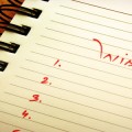 'Wish list' written on a spiral pad