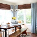 Dining Room updates bamboo shades-bench-wicker chairs white hutch blue and yellow (1)featuered image