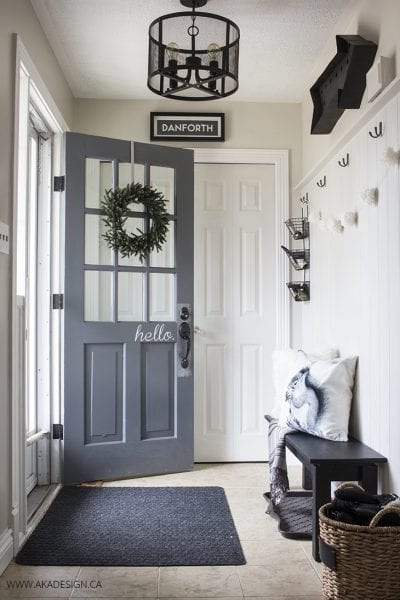 Neutral black and white entryway | 100+ Beautiful Mudrooms and Entryways at Remodelaholic.com