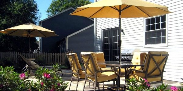 backyard overhaul with new landscaping and patio furniture