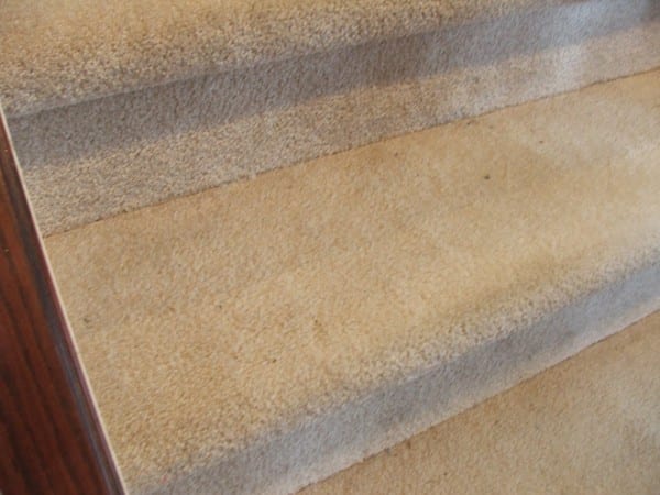 2 Update Your Stairs By Tearing Up The Carpet And Using The Wood Beneath, By Cleverly Inspired, Featured On @Remodelaholic