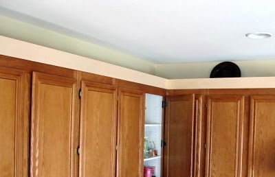 10 Create a staggered cabinet look using crown molding, by My Uncommon Slice of Suburbia featured on @Remodelaholic