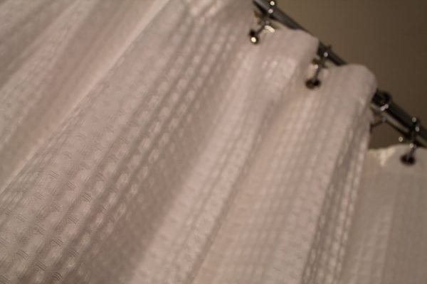25 Simple shower curtain from Target, by Elizabeth and Co featured on @Remodelaholic