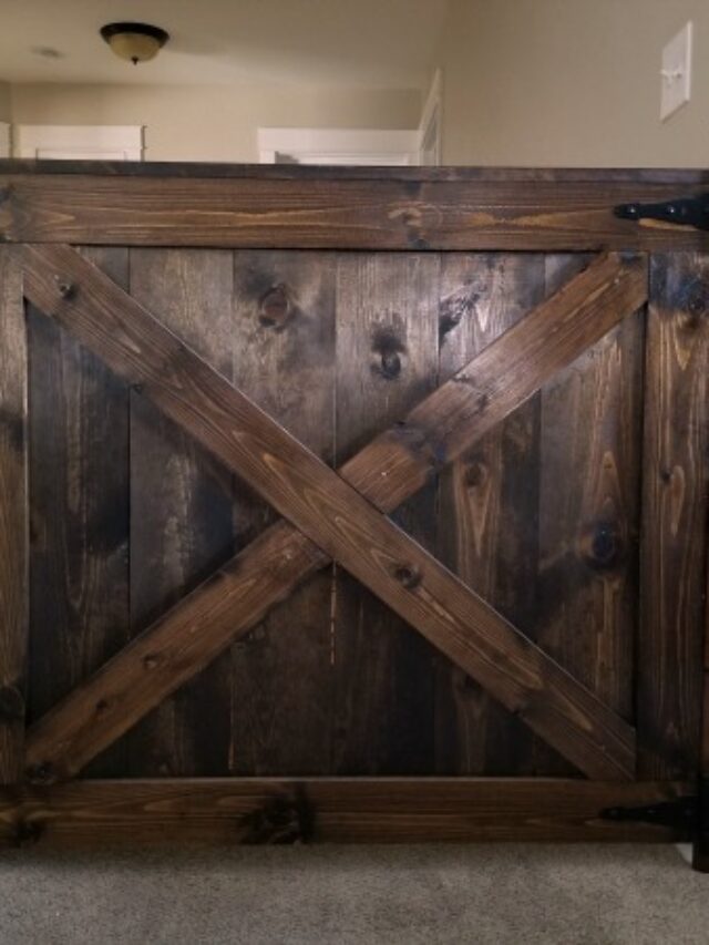 Barn Door Baby Gate Attached To Stair Wall And Banister Without Screws #remodelaholic