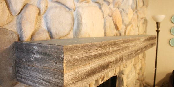 Installing a wood mantel on a stone wall