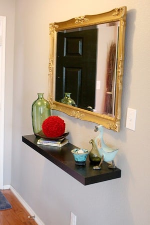 Entry updates black door white moldings entry table columns (17)