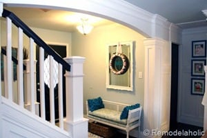 Entry updates black door white moldings entry table columns (27)