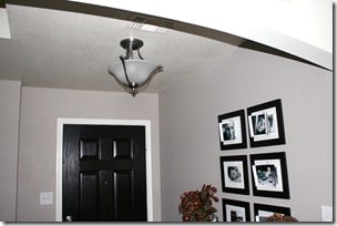 Entry updates black door white moldings entry table columns (7)