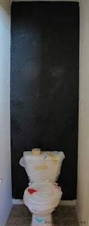 paint the wall before adding pallet wood Remodelaholic