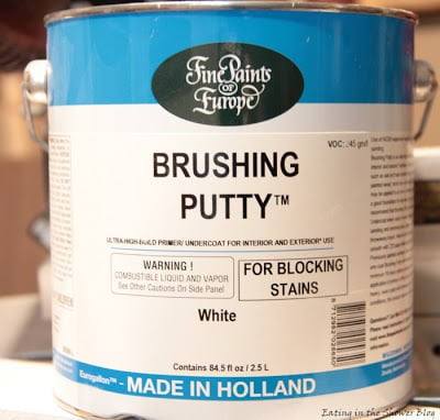 use brushing putty to cover wood grain when painting cabinets