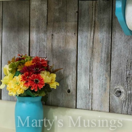 unique wood kitchen backsplash from reclaimed fence posts