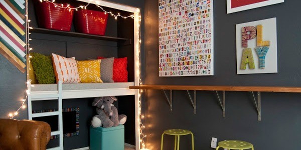 colorful kids playroom with reading loft via Remodelaholic