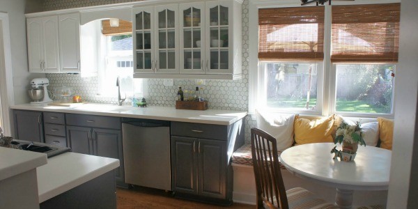 gray and white kitchen makeover with painted cabinets, featured on Remodelaholic