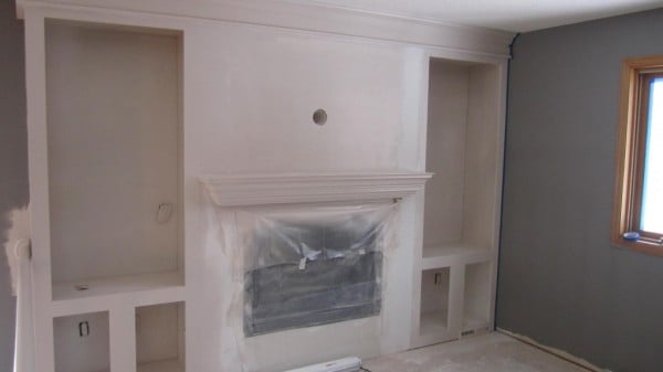 spray painted fireplace makeover, construction2style on Remodelaholic