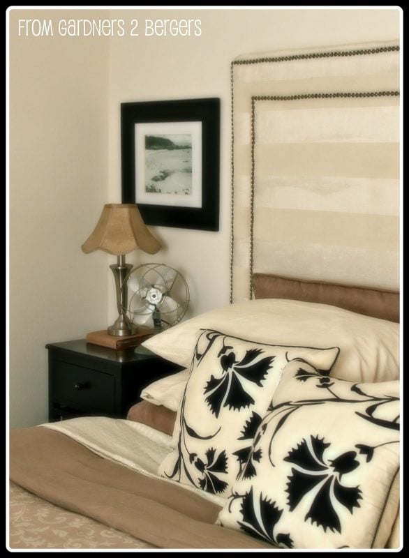 striped square headboard with double nailhead trim via Remodelaholic