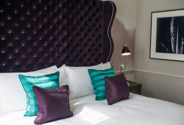 tufted scalloped wingback headboard in black via DecorPad