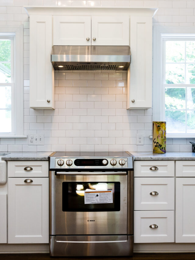 Cropped 6 Renovated Kitchen With White Subway Tile Marble And Farmhouse Sink Cobblestone DG On Remodelaholic.jpg