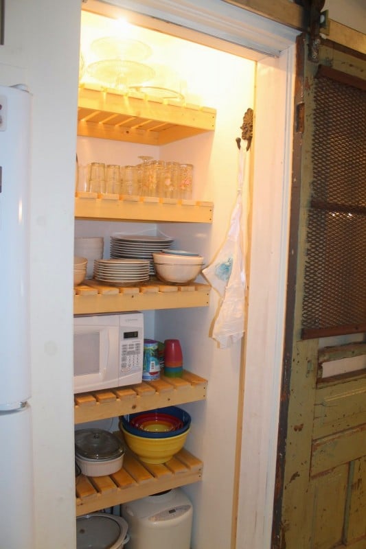 use pantry wood slat shelves to store dishes instead of food, Girl Meets Carpenter on @Remodelaholic