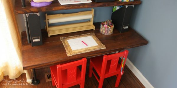 AWESOME tutorial for DIY industrial shelves and desks by Designer Trapped in a Lawyer's Body for Remodelaholic.com.