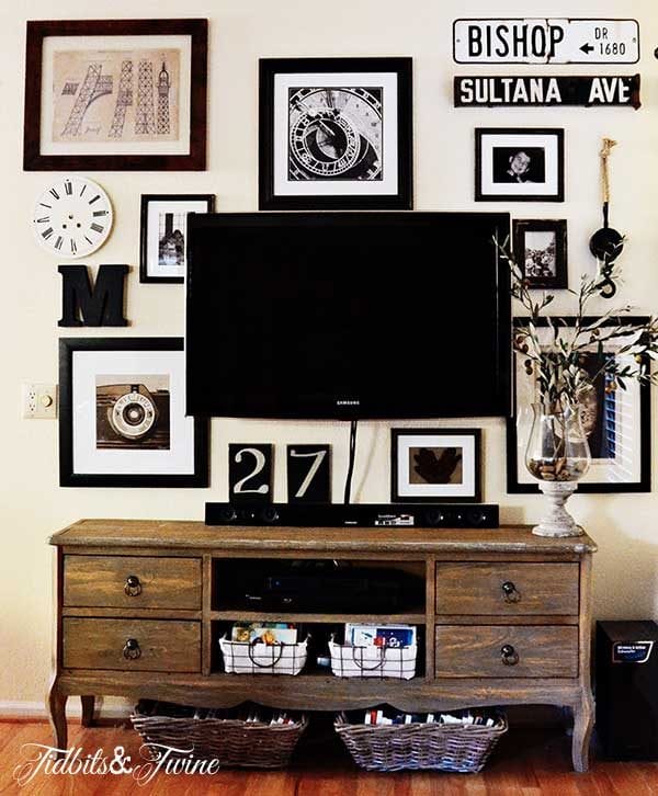 black and white vintage gallery wall around the TV (Tidbits and Twine)