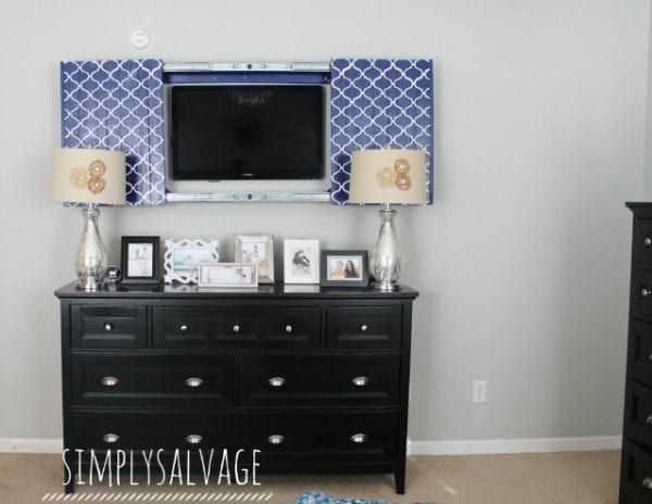 build a frame and sliding doors to hide the tv (Simply Salvage)