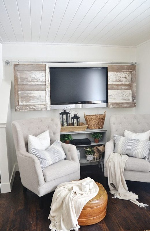hide television behind sliding barn doors DIY (Liz Marie Blog)
