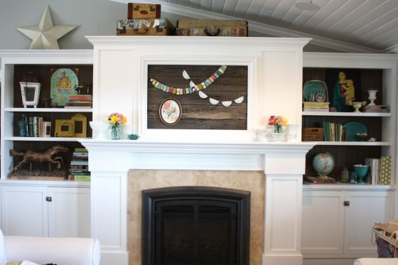 Remodelaholic 95 Ways To Hide Or Decorate Around The Tv Make A Reclaimed Wood Cover For Framed Tv The Pleated Poppy