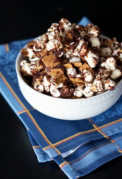 You don't have to go camping to enjoy the delicious flavor of s'mores. Get cooking with these 10 delicious s'mores inspired desserts! 10 Delicious S'mores Inspired Desserts via @tipsaholic #smores #desserts #marshmallows #chocolate #grahamcrackers #summer