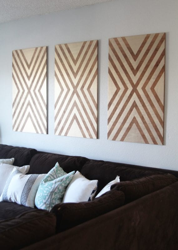 diy large wall art from plywood, tape, and paint (via Home Depot)
