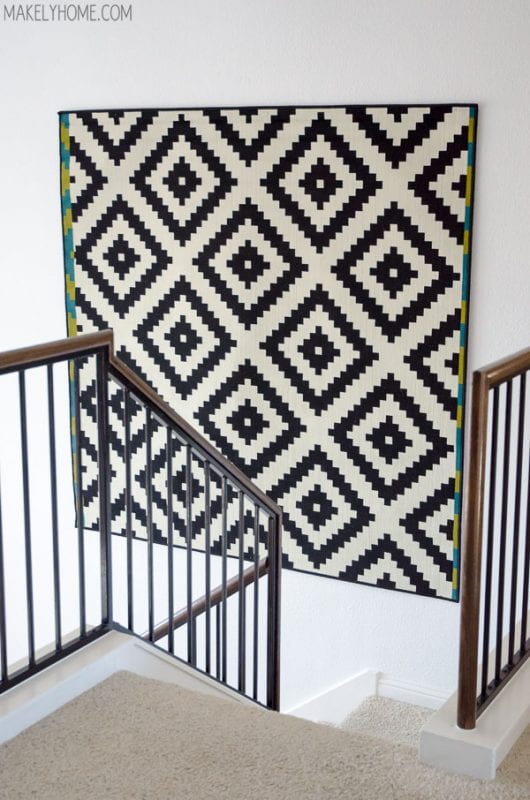 how to hang a rug on the wall for a large DIY wall art idea (Makely)