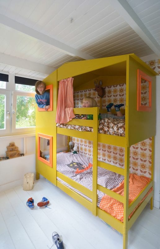 yellow IKEA hack house bunkbed for kids, via Rafa Kids