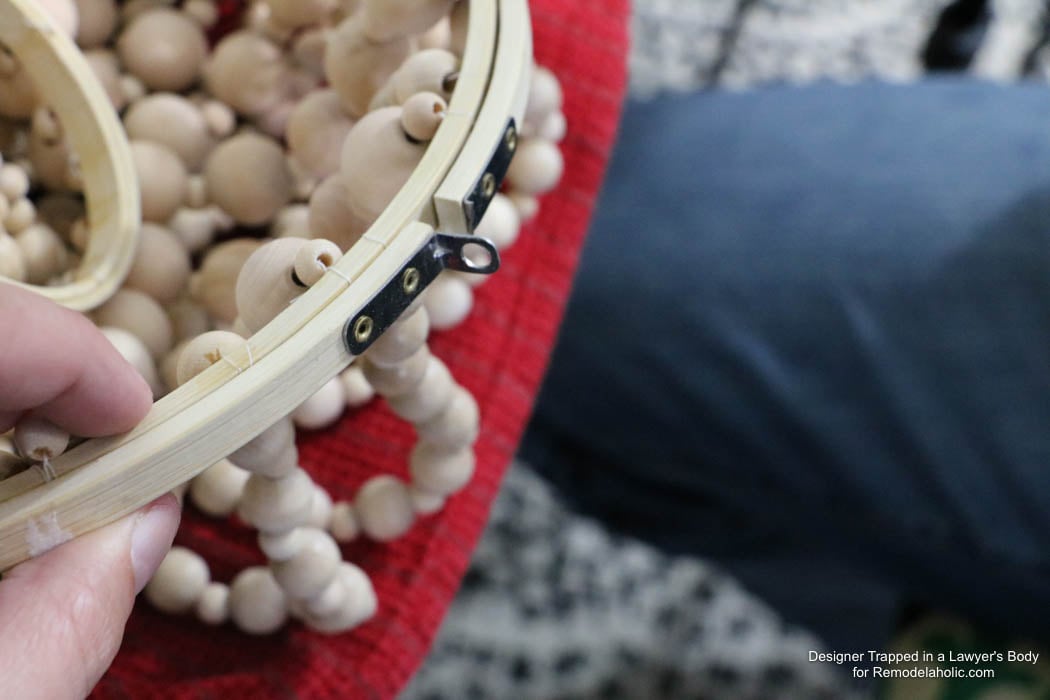 WOW! Come learn how to make your own wood bead chandelier with this awesome tutorial by Designer Trapped in a Lawyer's Body for Remodelaholic.com!
