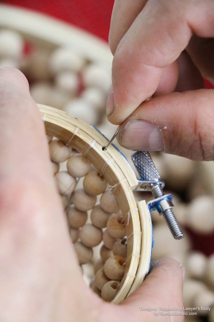 WOW! Come learn how to make your own wood bead chandelier with this awesome tutorial by Designer Trapped in a Lawyer's Body for Remodelaholic.com!