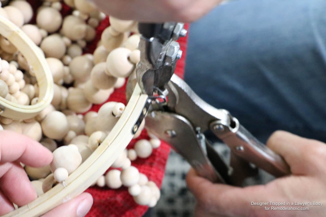 WOW! Come learn how to make your own wood bead chandelier with this awesome tutorial by Designer Trapped in a Lawyer's Body for Remodelaholic.com!