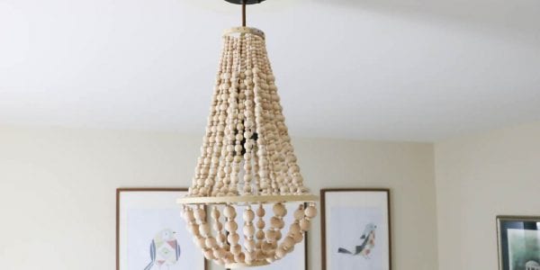WOW! Come learn how to make your own wood bead chandelier with this awesome tutorial by Designer Trapped in a Lawyer's Body for Remodelaholic.com!