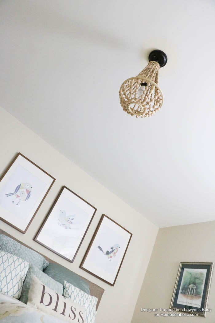 WOW! Come learn how to make your own wood bead chandelier with this awesome tutorial by Designer Trapped in a Lawyer's Body for Remodelaholic.com!