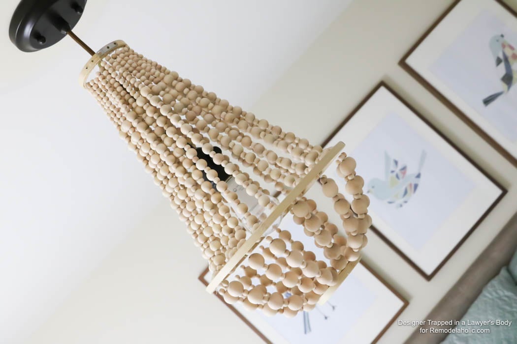 WOW! Come learn how to make your own wood bead chandelier with this awesome tutorial by Designer Trapped in a Lawyer's Body for Remodelaholic.com!
