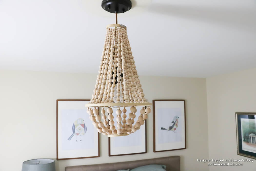 WOW! Come learn how to make your own wood bead chandelier with this awesome tutorial by Designer Trapped in a Lawyer's Body for Remodelaholic.com!