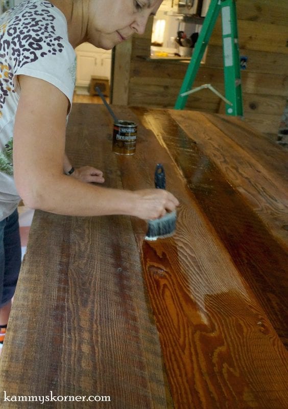 11 Polyurethane to finish reclaimed barn wood table top, by Kammie's Korner featured on @Remodelaholic