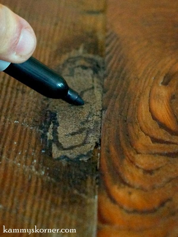 12 How to fill knots when reclaiming barn wood, stainable wood filler and sharpie, by Kammie's Korner featured on @Remodelaholic