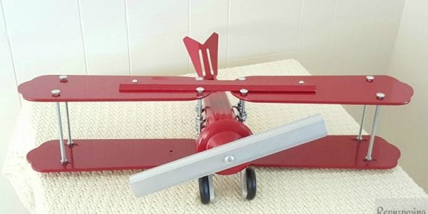 feat 19-Build-decorative-airplane-from-repurposed-ceiling-fan-blades-front-view-5-by-Repurposing-Junkie-featured-on-@Remodelaholic